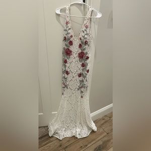 White formal long dress/prom dress. Flower embroidery and built in bra. Size 6